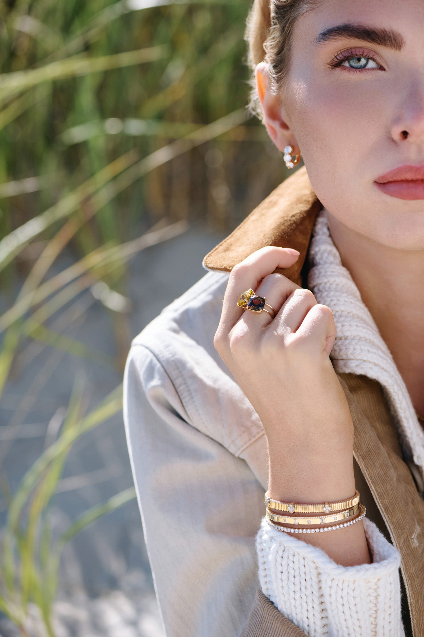 Women wearing gemstone and lab grown diamond jewelry