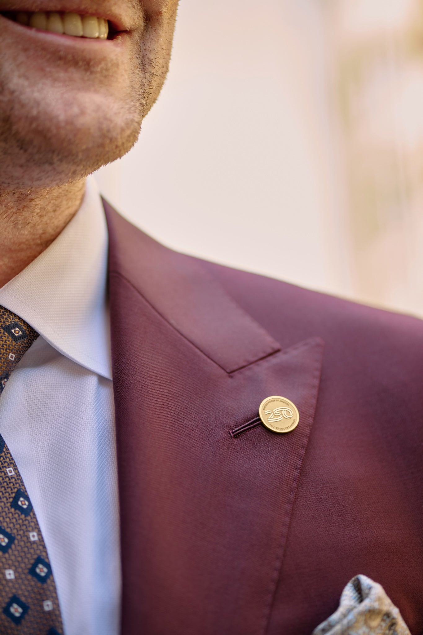 14K gold America250™ lapel pin featuring the official America250 logo, luxury commemorative jewelry honoring 250 years of American history.