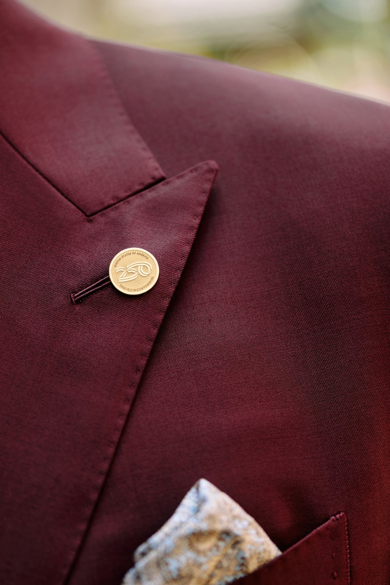 Official America250™ 14K gold lapel pin featuring the America250 logo, licensed commemorative fine jewelry celebrating America&