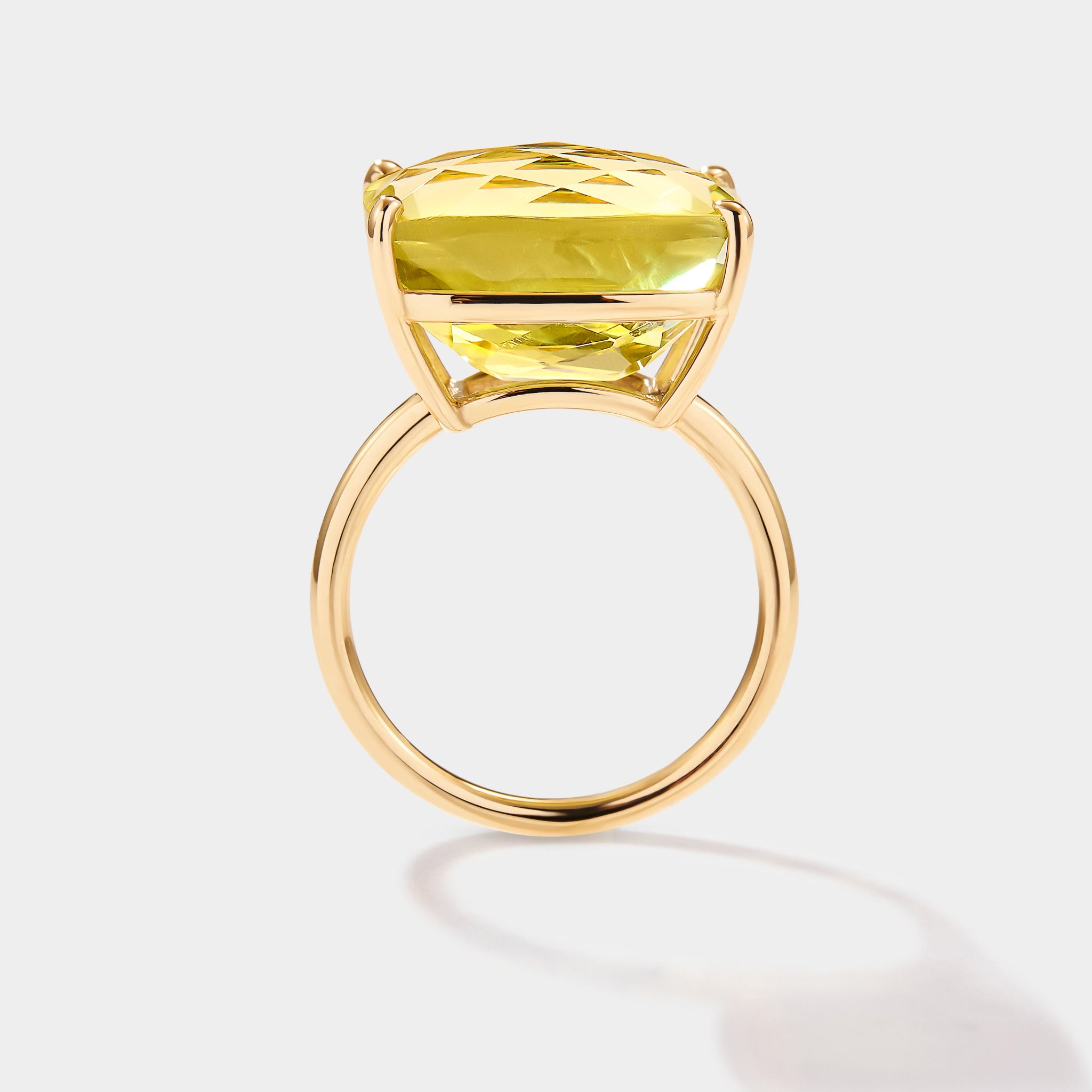 Side profile of lime quartz signature ring with large green gemstone
