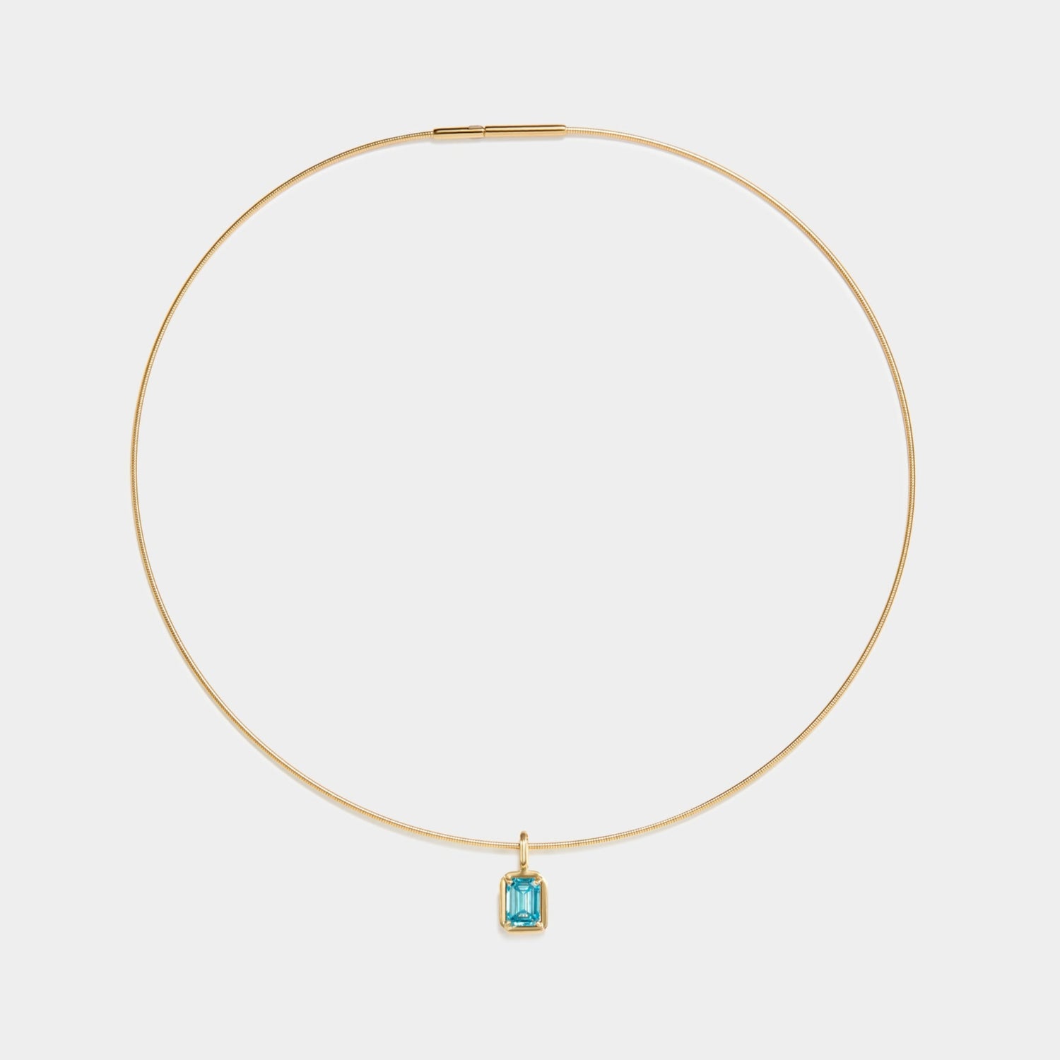 Omega chain with blue diamond pendant