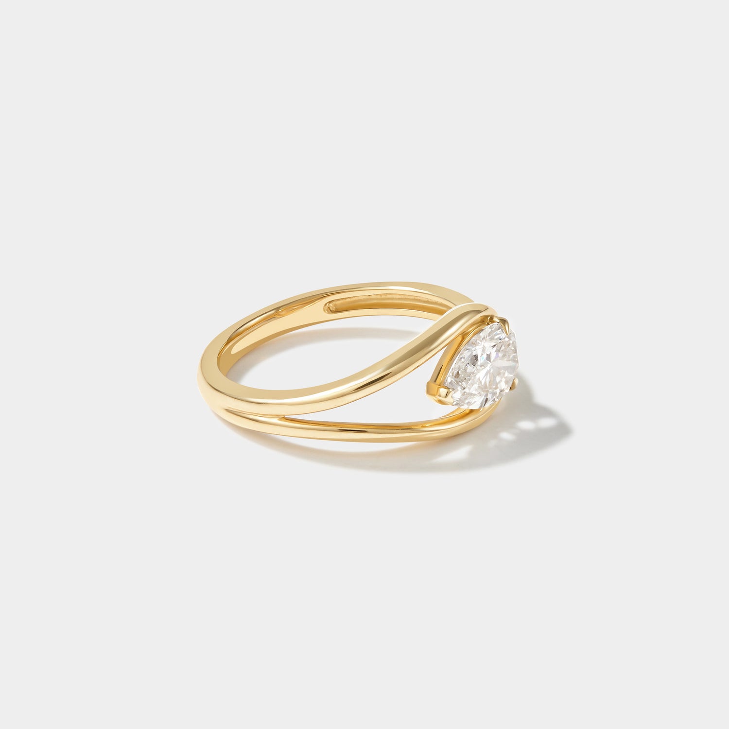 East-west set pear lab grown diamond engagement ring in 14k yellow gold