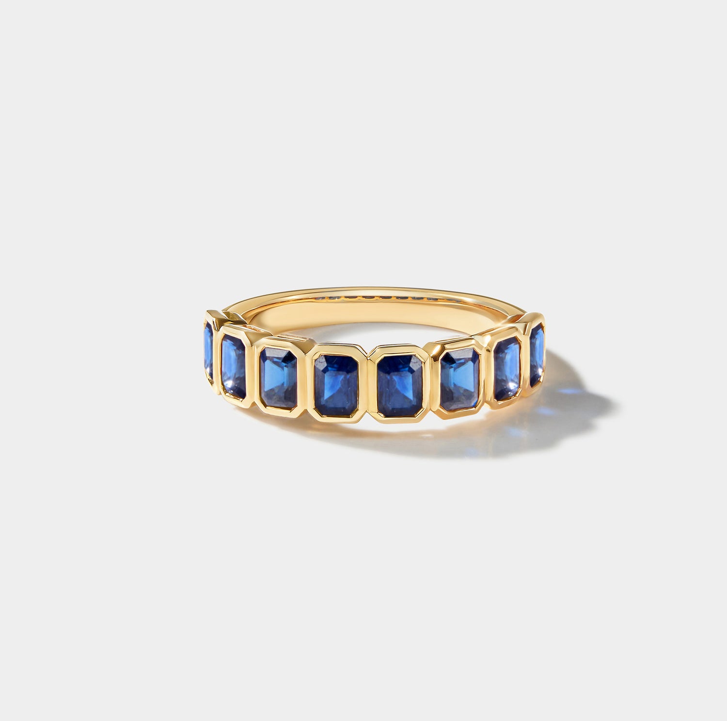 14k gold sapphire bezel eternity band with lab grown sapphires