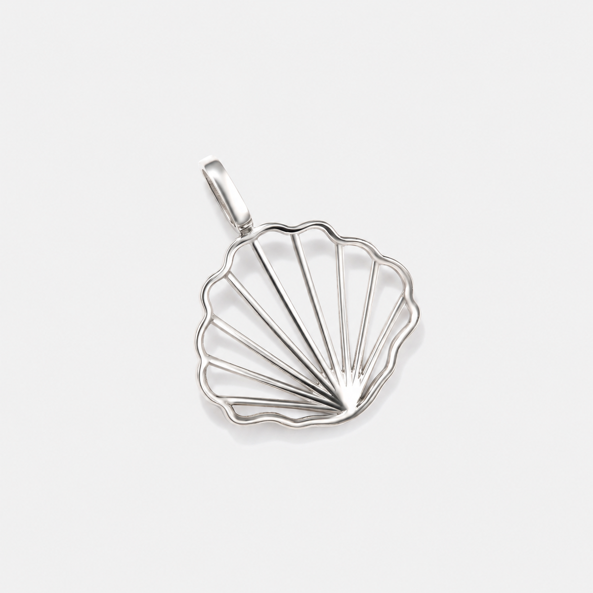 14K gold scallop shell pendant, a timeless piece of coastal jewelry inspired by Cape Cod.