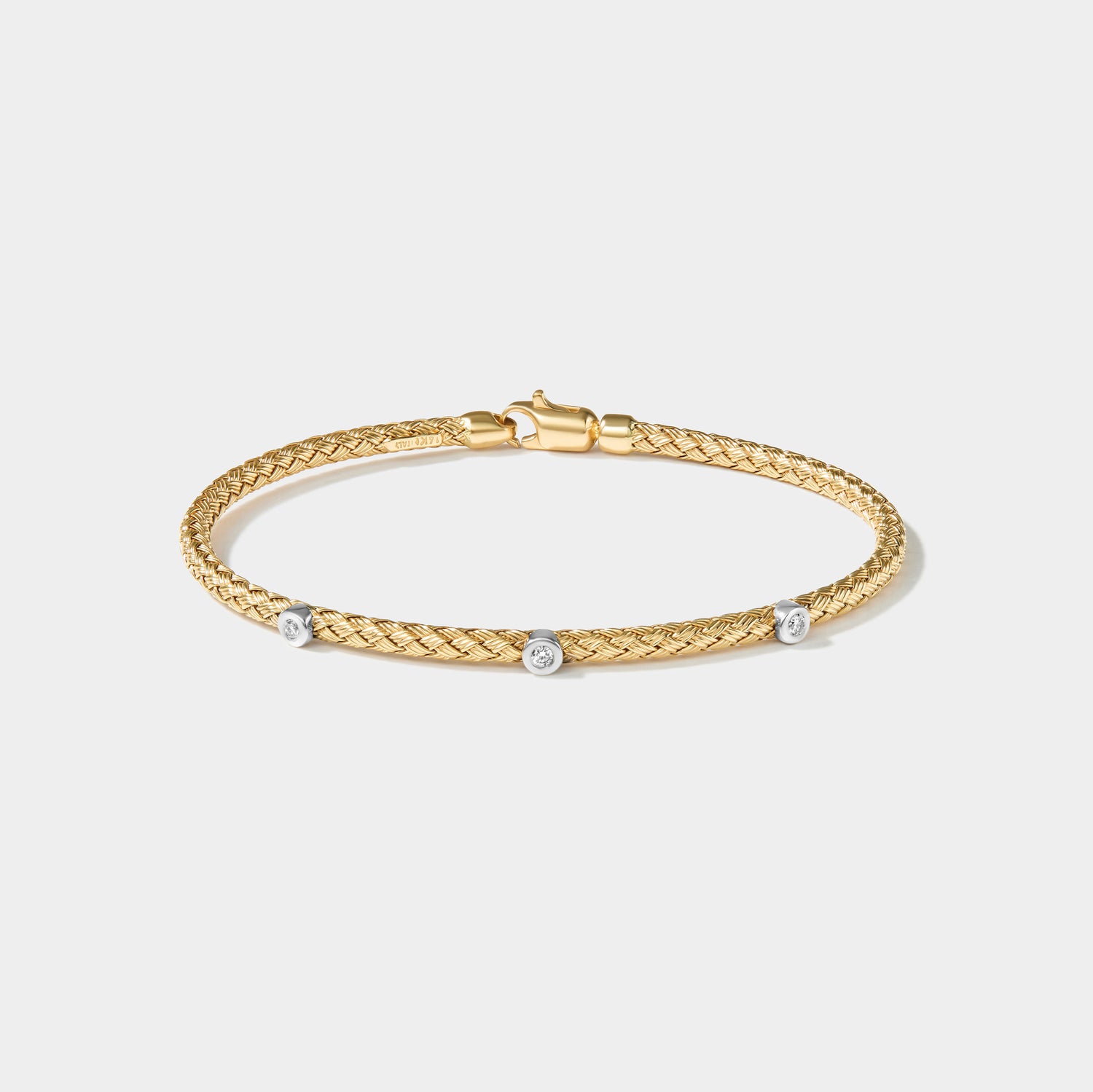 14k yellow gold seagrass bracelet with 3 lab grown diamonds and braided rope design