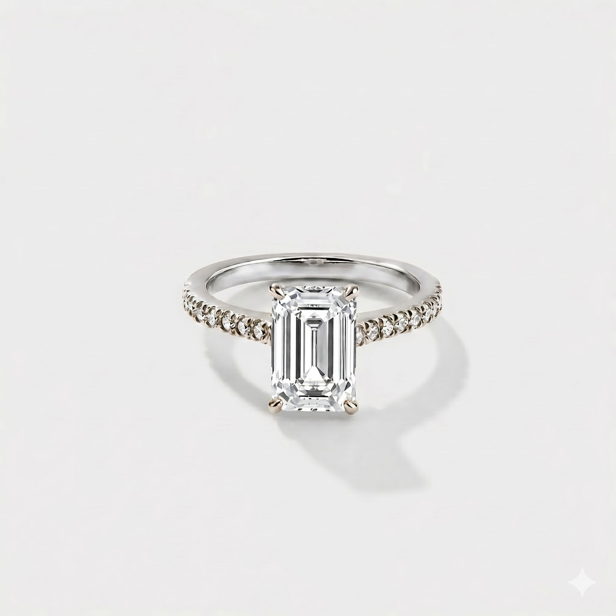 Emerald cut cathedral halo lab-grown diamond engagement ring in 14K white gold by Cove Fine Jewelry