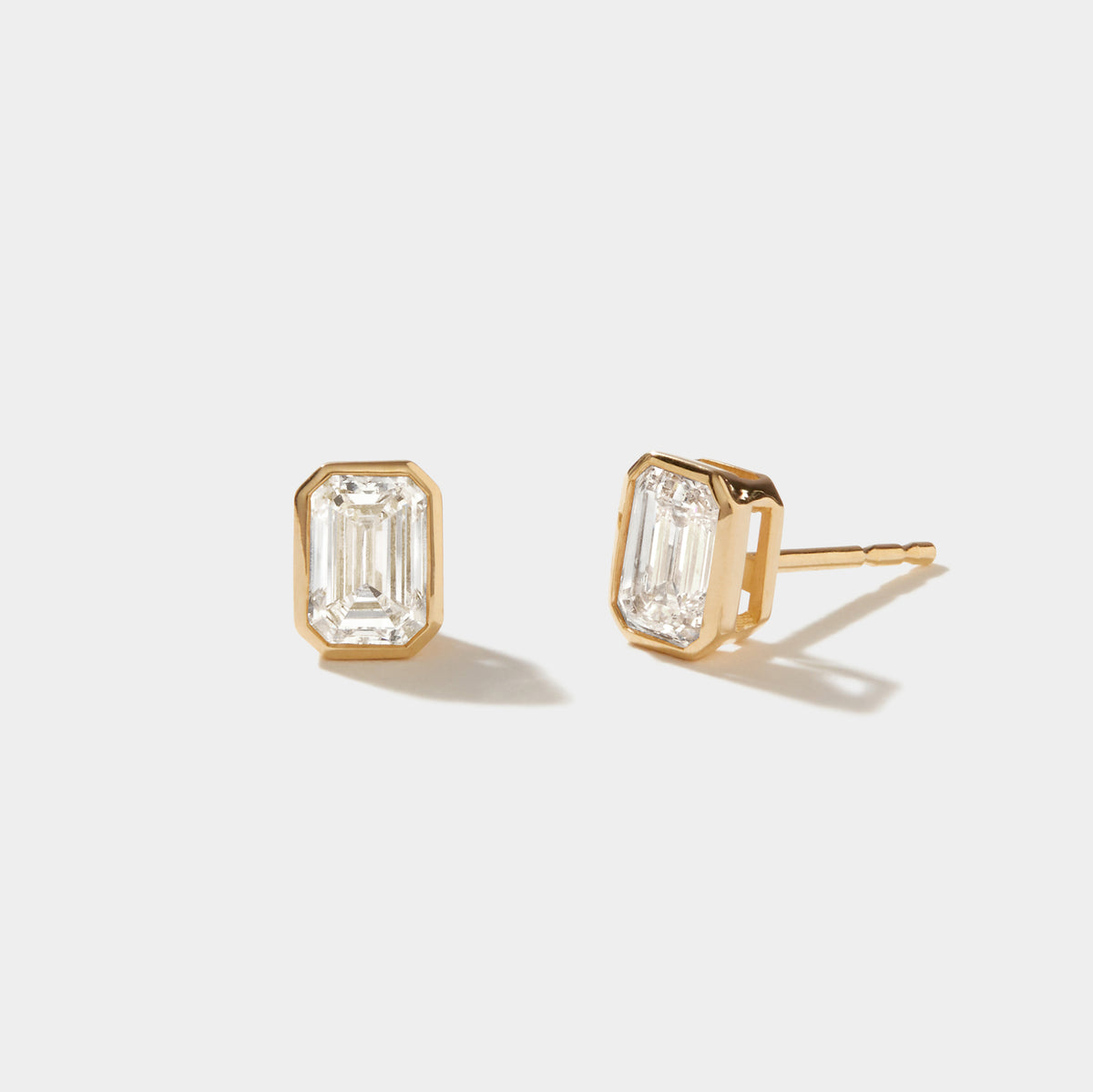 Emerald-cut lab-grown diamond bezel stud earrings in 14k yellow gold