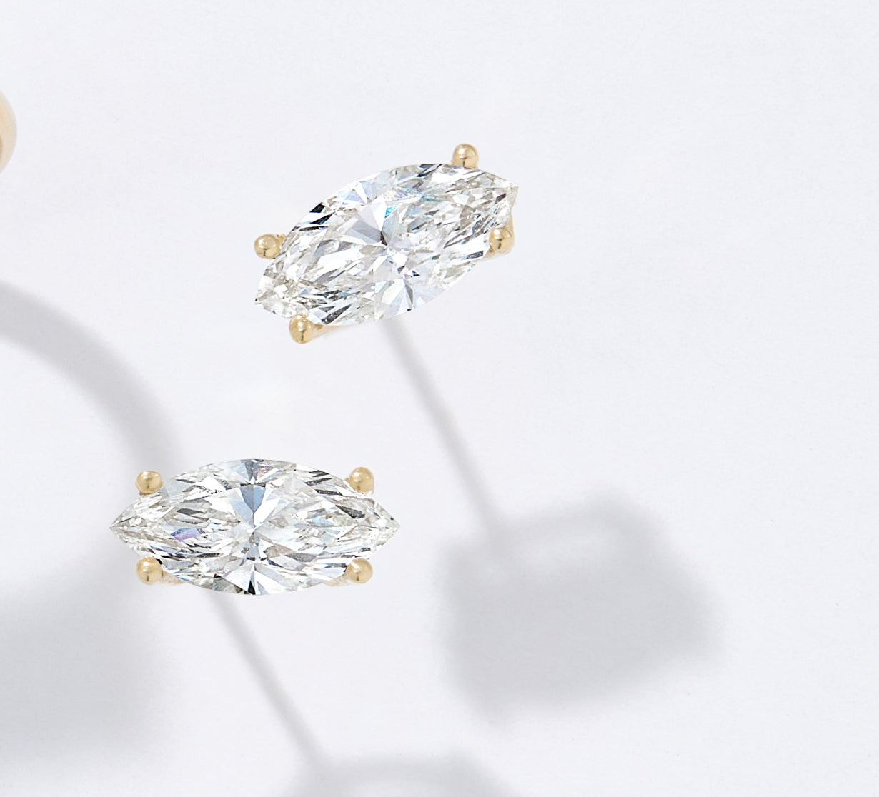 Marquise diamond stud earrings in solid 14k gold featuring lab grown marquise cut diamonds