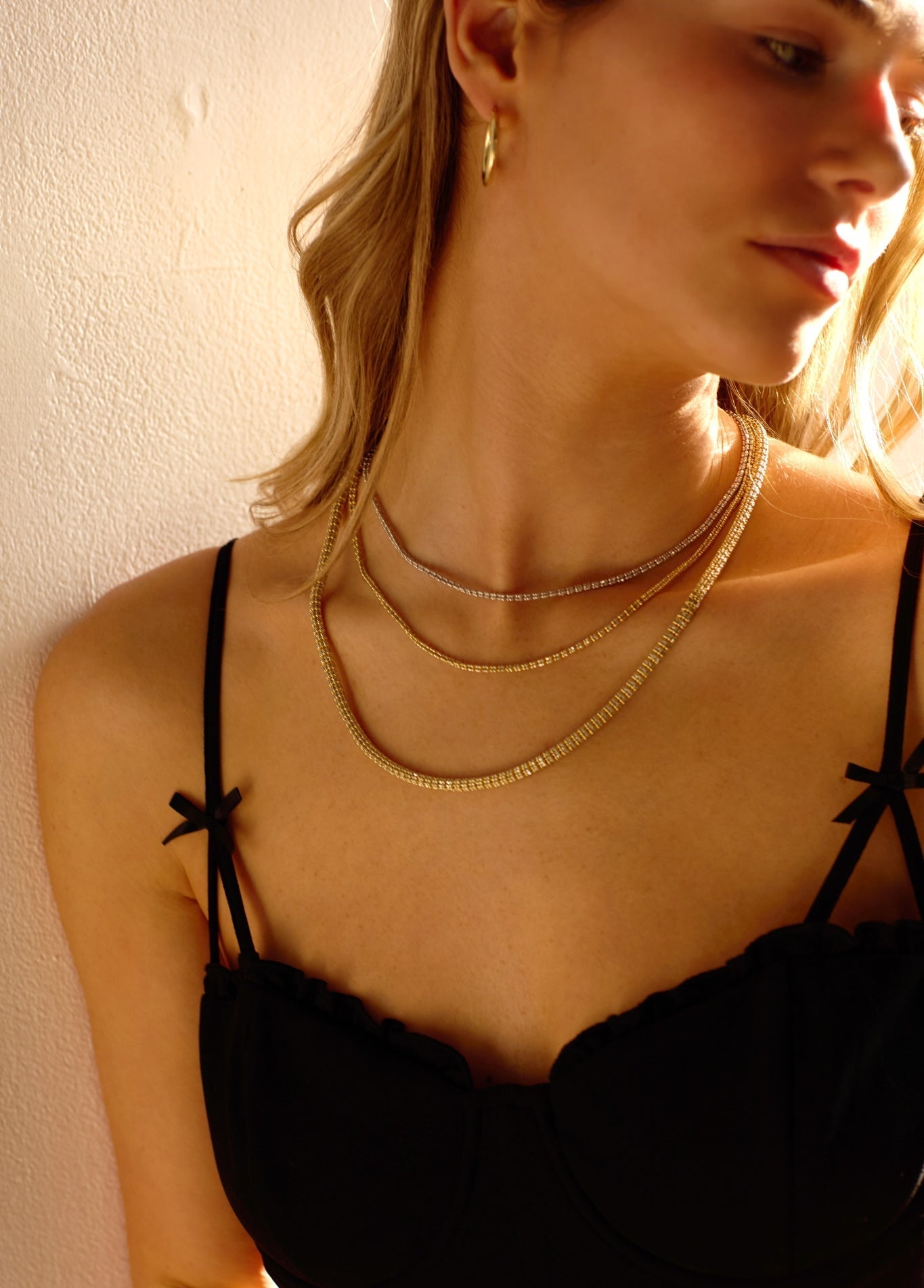 Cove Fine Jewelry Tidal Tennis Necklace in solid 14k gold, showcasing a diamond-cut chain that reflects light for a sparkling, ocean-inspired look of 14k gold thick necklace