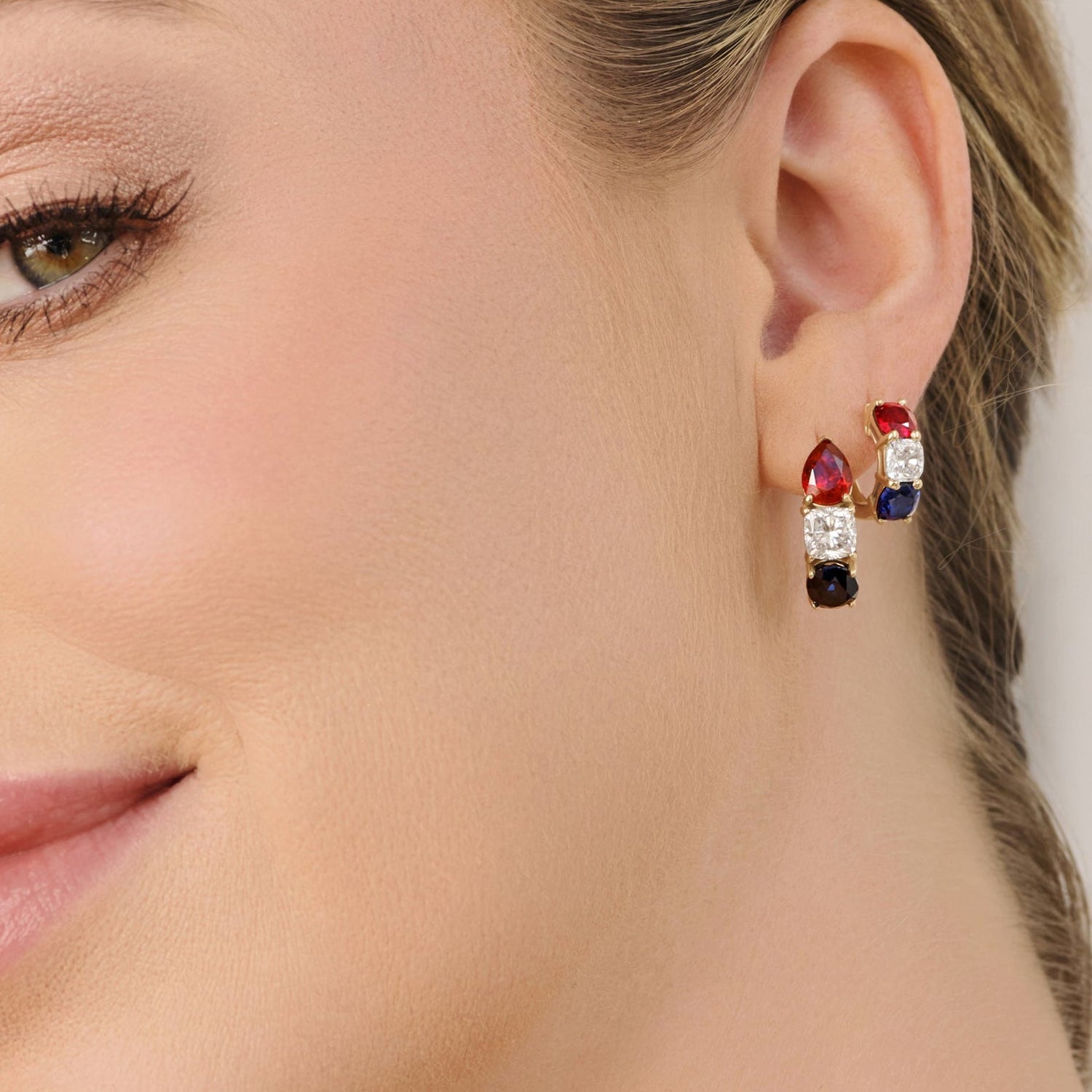 14k gold hoop earrings from the America 250 collection featuring ruby, diamond, and sapphire gemstone accents by Cove Fine Jewelry