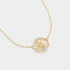 14K yellow gold scallop shell necklace with a bezel-set lab-grown diamond, inspired by Cape Cod coastal jewelry.