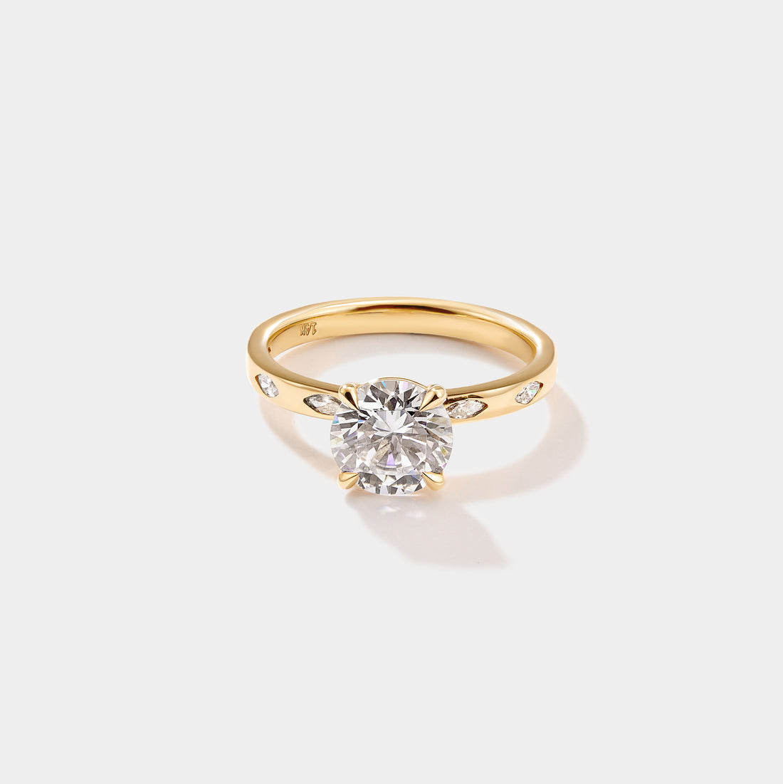 Round Solitaire with Marquise Band