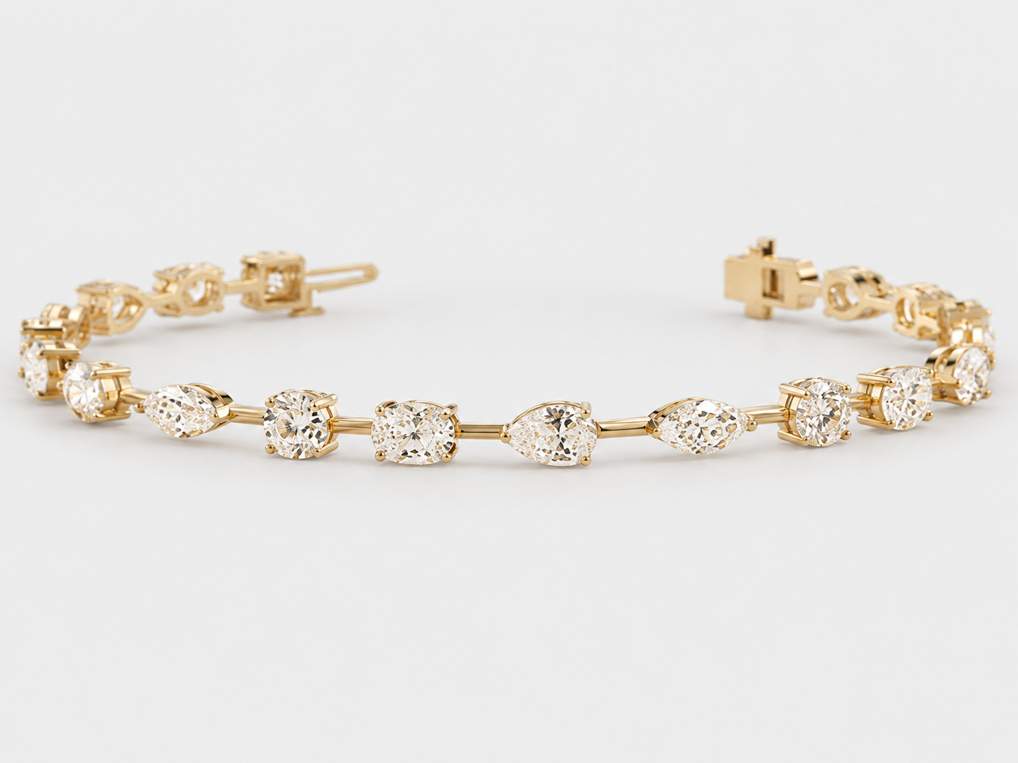 mixed-shape lab-grown diamond tennis bracelet with oval, marquise, pear and round diamonds in solid 14k gold 5 carats
