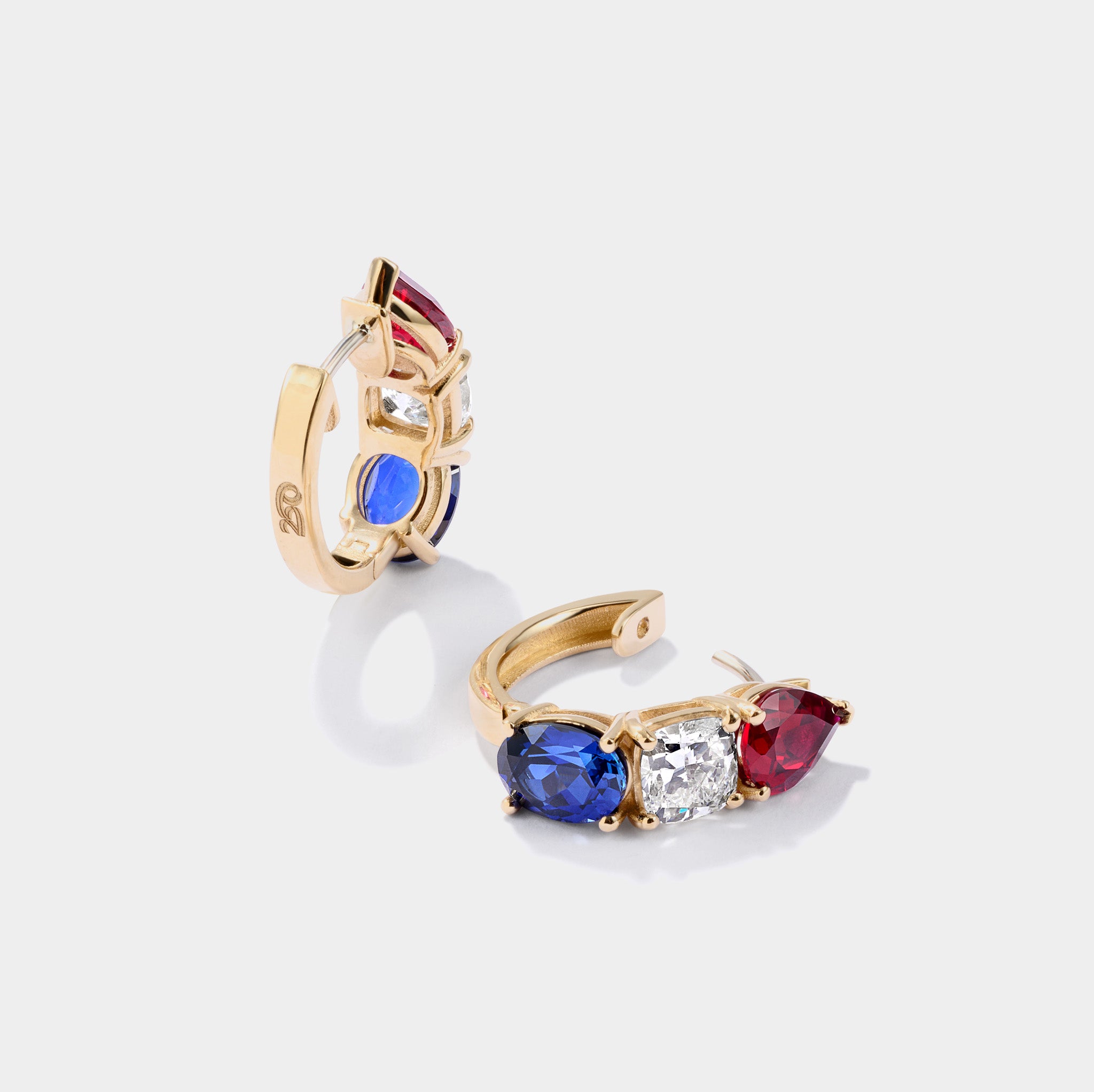 Officially licensed America250™ fine jewelry earrings in 14K gold with diamonds, rubies, and sapphires, made in the USA.