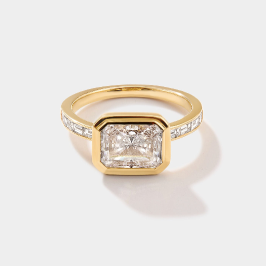 East west set emerald lab grown diamond ring.