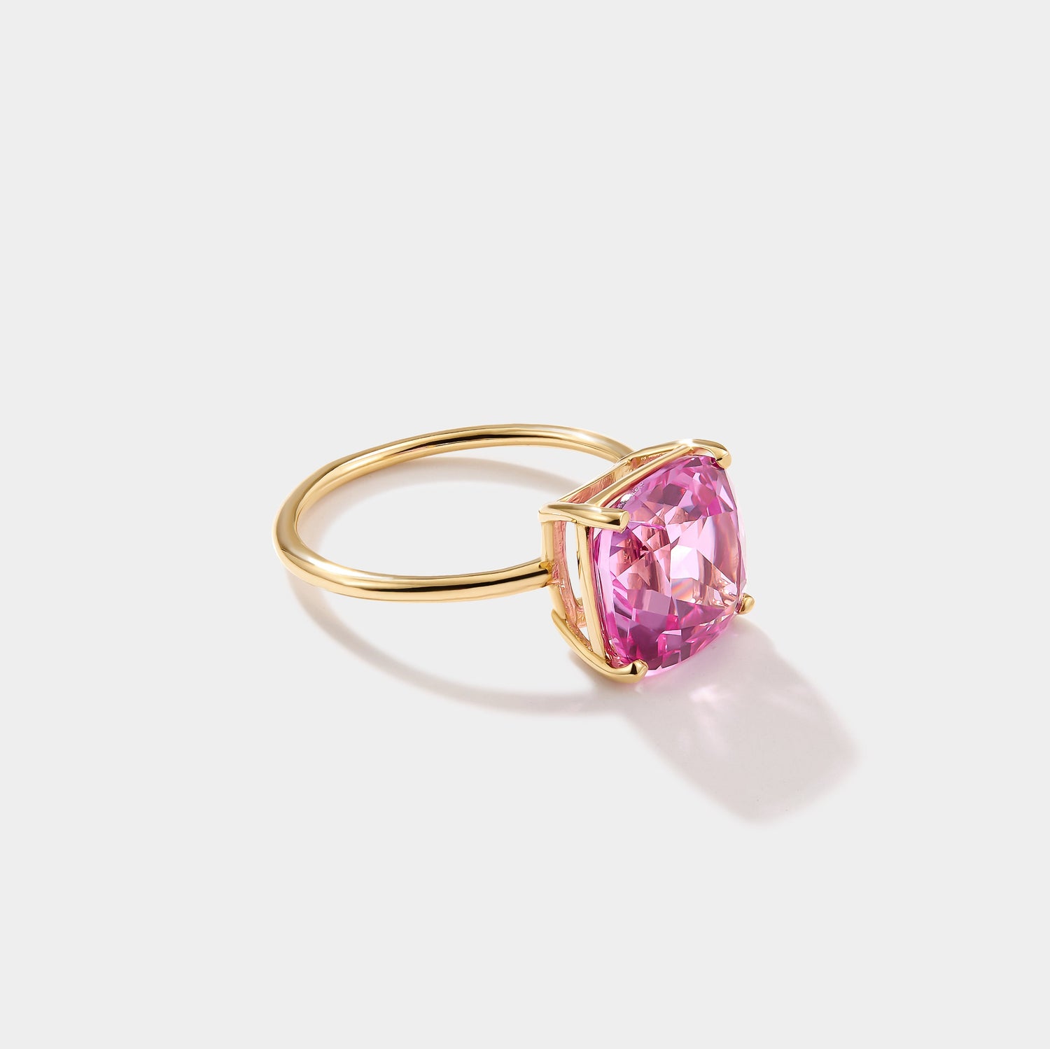 Palm Beach pink sapphire ring set in solid 14k gold with cushion cut gemstone
