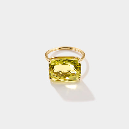 Close up of lime quartz checkerboard cut gemstone ring in 14k gold