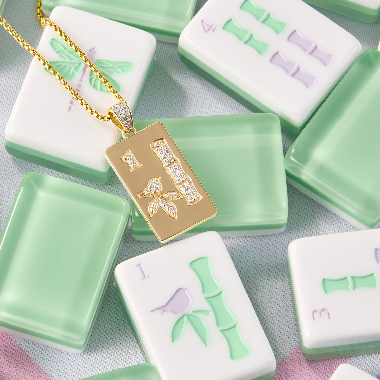 Mahjong accessory pendant in 14k gold designed as heirloom fine jewelry