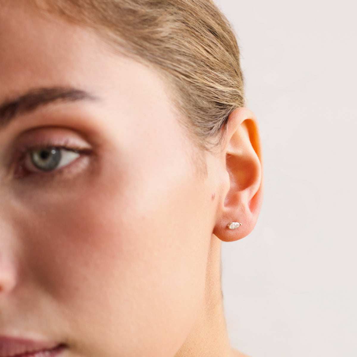Marquise stud earring sold individual or pair.