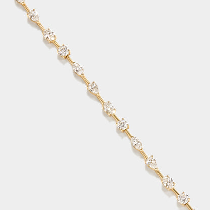 14k gold lab grown diamond tennis bracelet with marquise, pear, and round diamonds