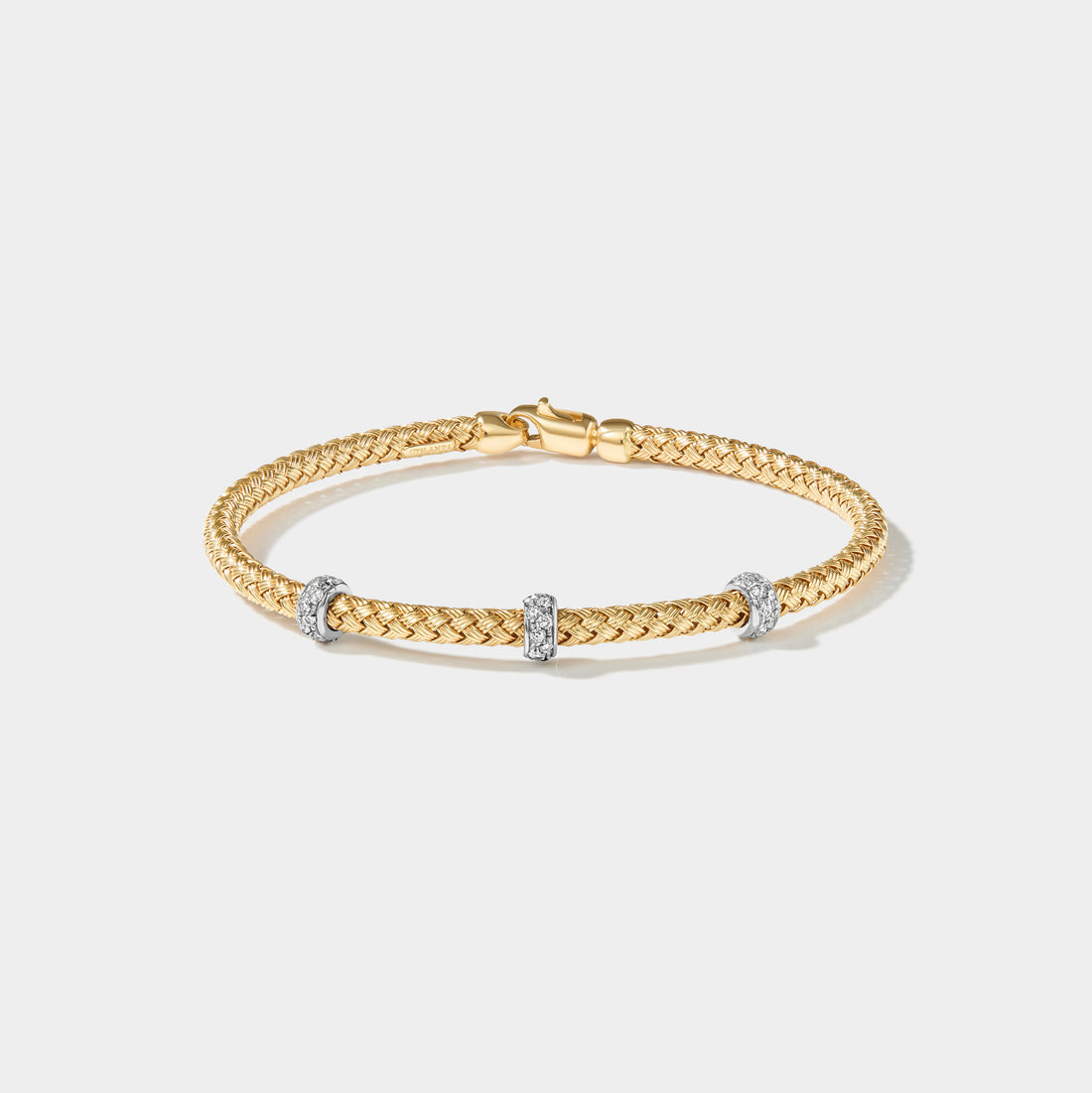 14k yellow gold seagrass bracelet with 27 lab grown diamonds and braided gold rope design