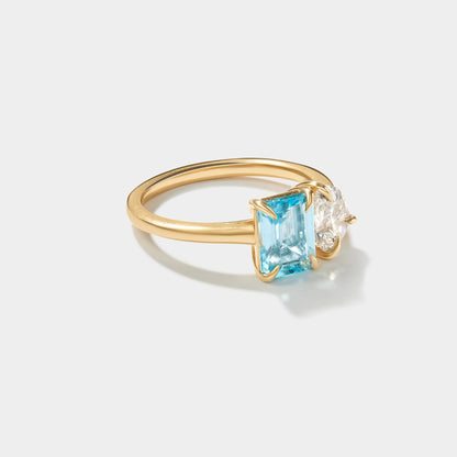 Two Stone Ring with diamond and emerald cut gemstone