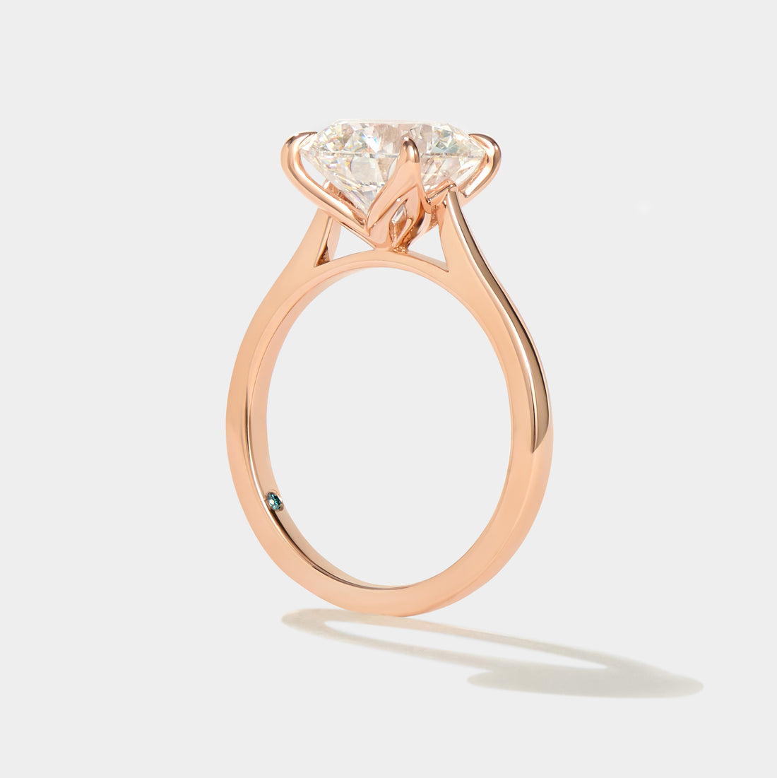 A cathedral engagement ring with a tulip design. 