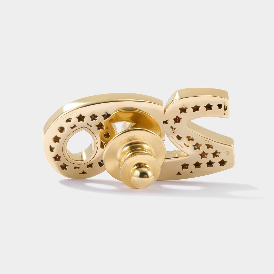Limited-edition America250 solid gold lapel pin handcrafted with red rubies, white diamonds and blue sapphires