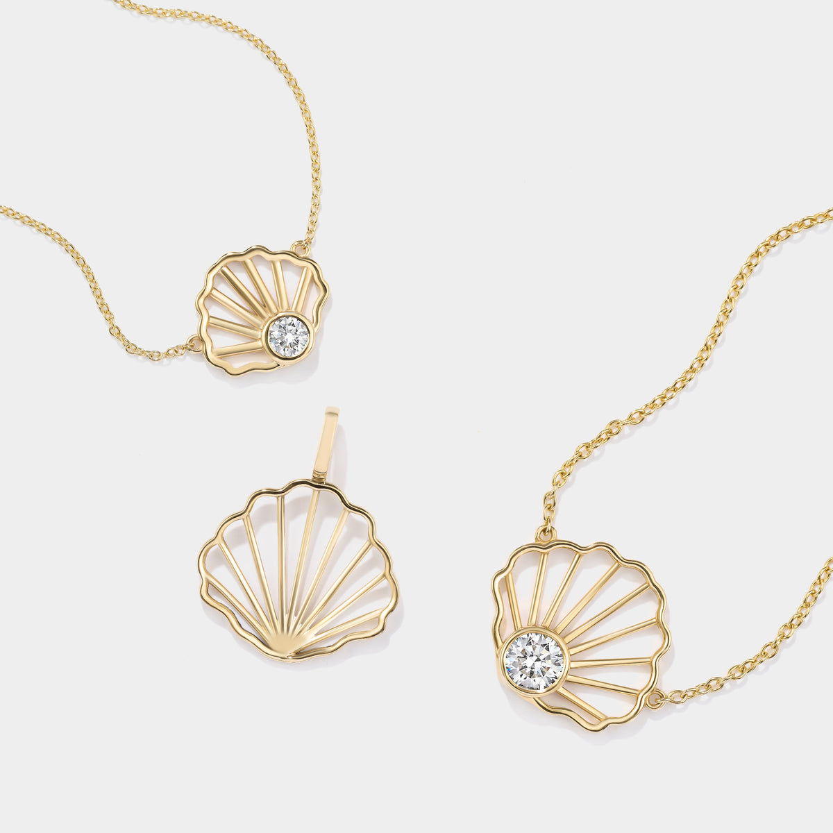 gift.jpg	Solid gold scallop shell pendant designed as a meaningful Cape Cod jewelry gift.