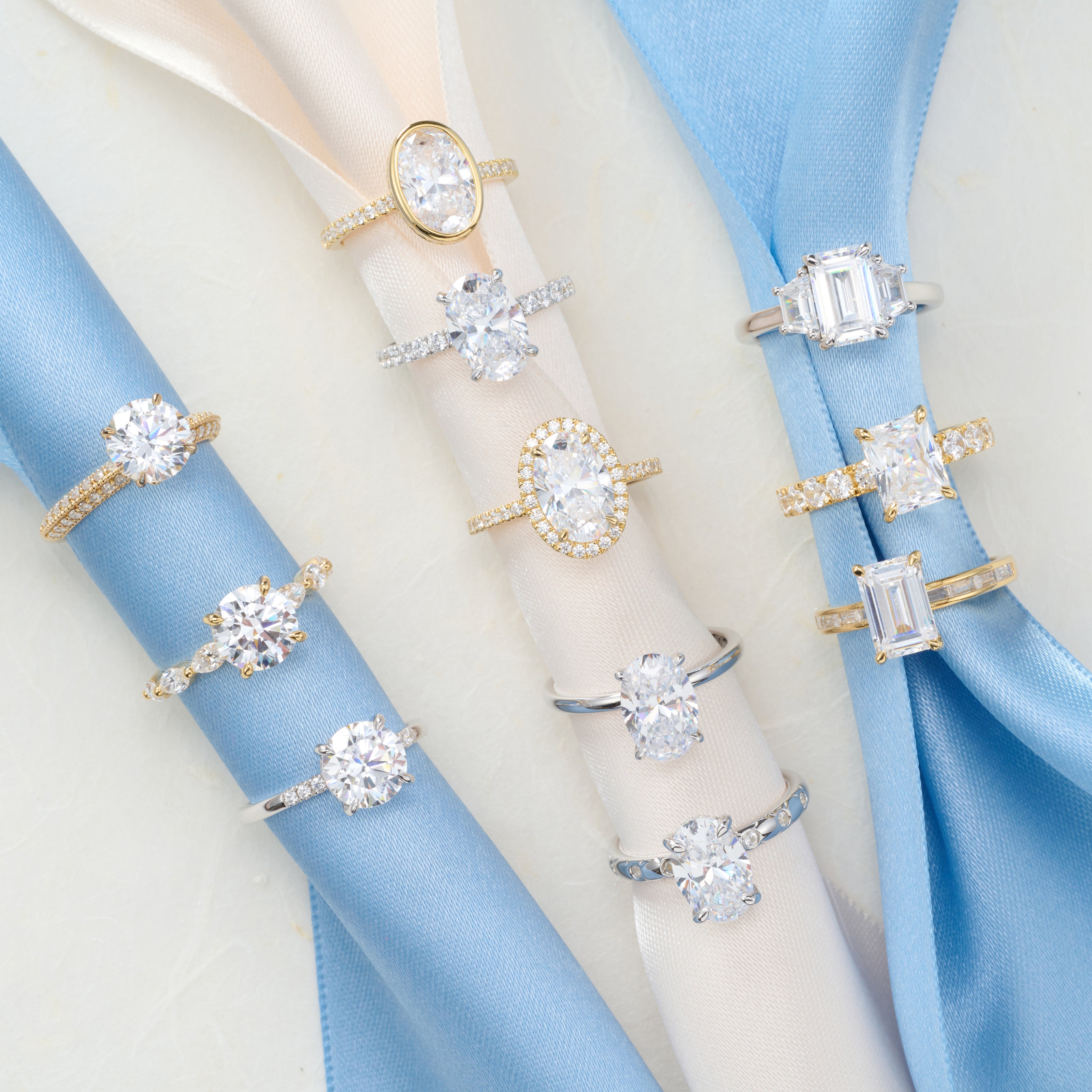 Coastal-inspired lab-grown diamond engagement rings in yellow and white gold with round, oval, emerald, and radiant-cut diamonds.