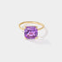 Purple cushion-cut amethyst solitaire ring in solid 14k yellow gold with four-prong setting, Drift by Cove Fine Jewelry.