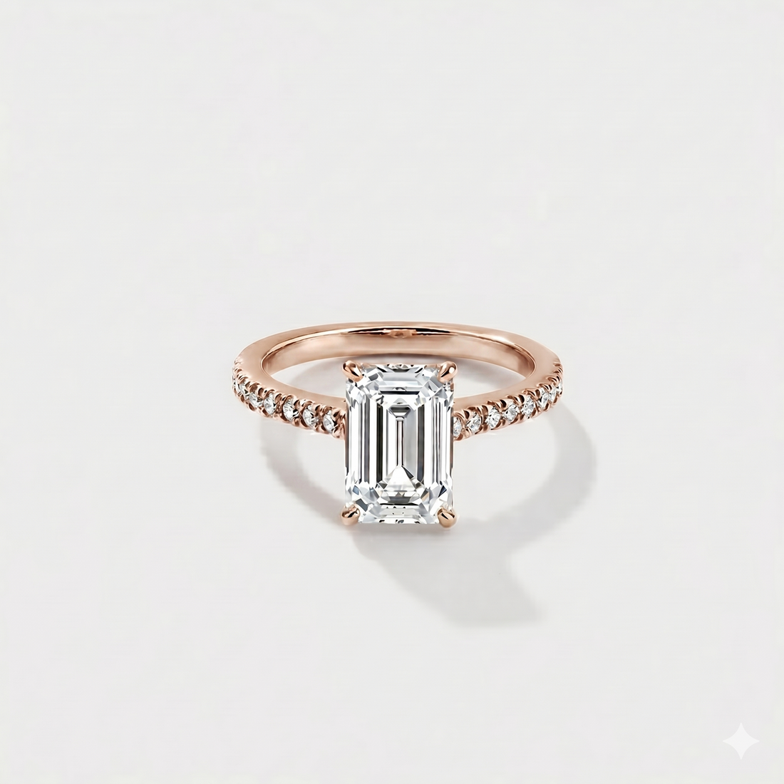 Emerald cut cathedral halo lab-grown diamond engagement ring in 14K rose gold by Cove Fine Jewelry