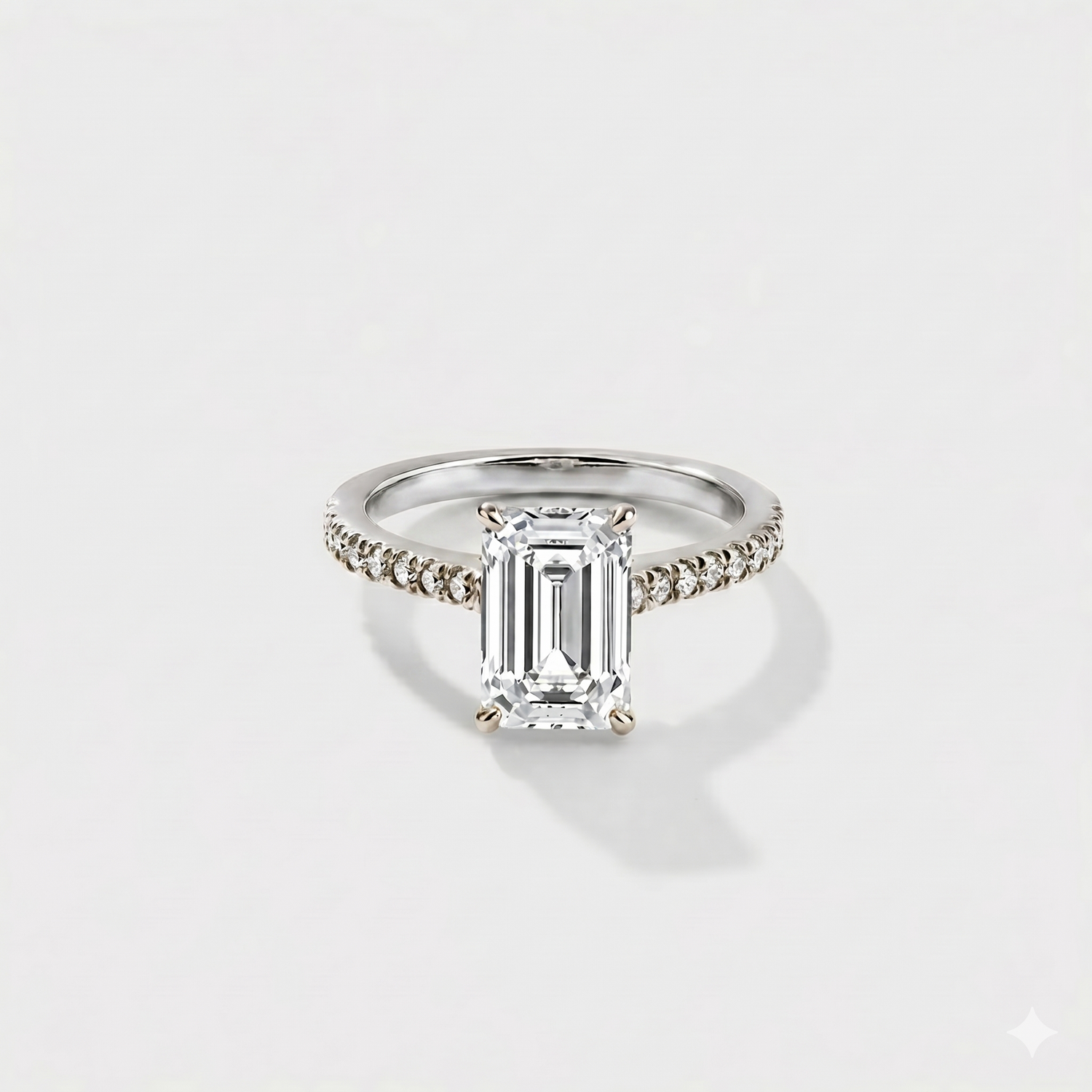 Emerald cut cathedral halo lab-grown diamond engagement ring in 14K white gold by Cove Fine Jewelry