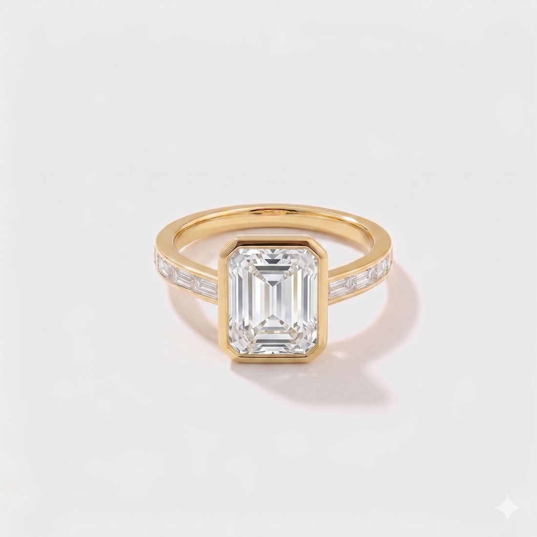 Emerald cut channel set solitaire lab-grown diamond engagement ring in 14K yellow gold by Cove Fine Jewelry