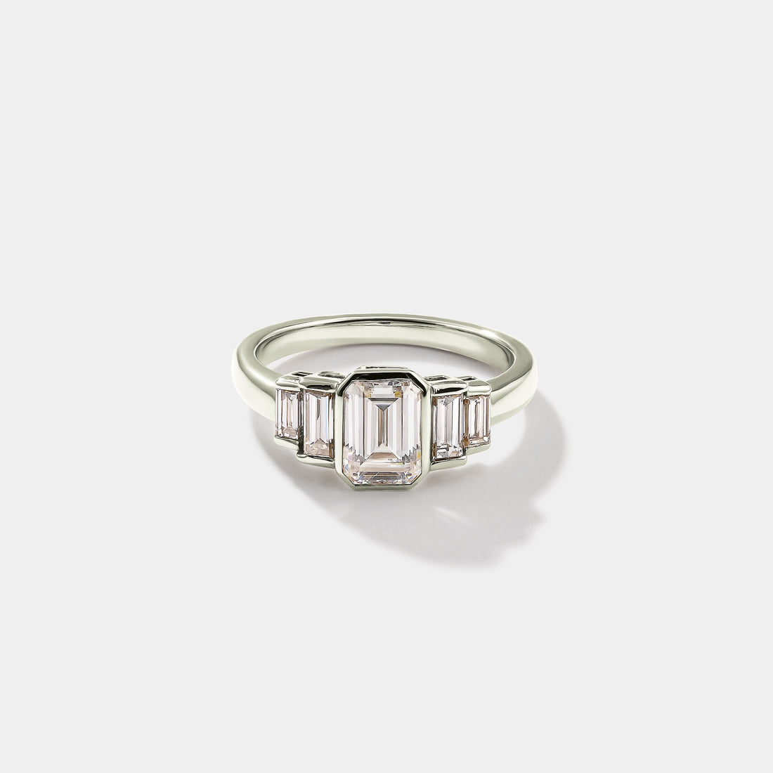 Emerald cut five stone bezel lab-grown diamond engagement ring in 14K white gold by Cove Fine Jewelry