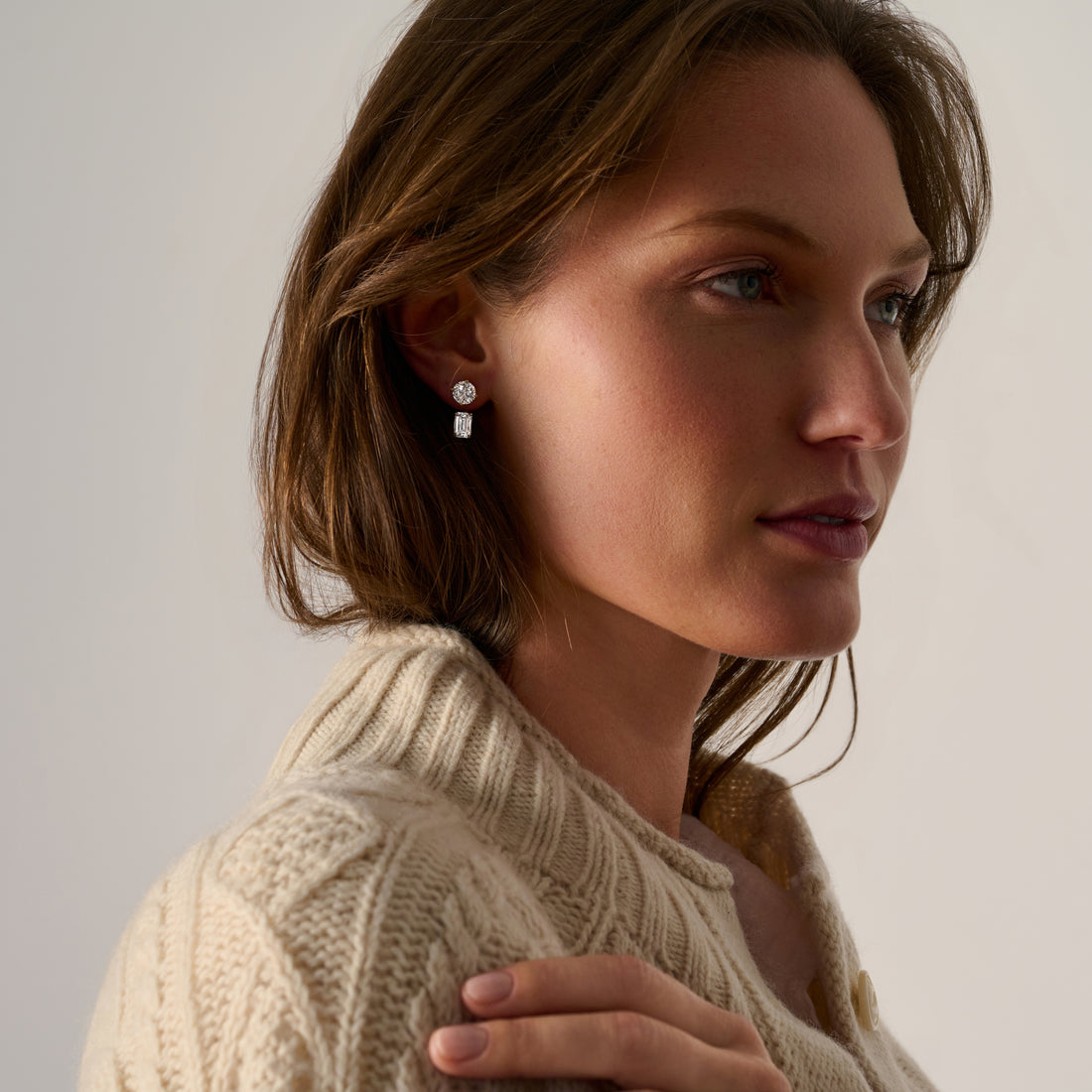 Emerald-cut lab-grown diamond drop ear jackets in 14k yellow gold with diamond stud tops.