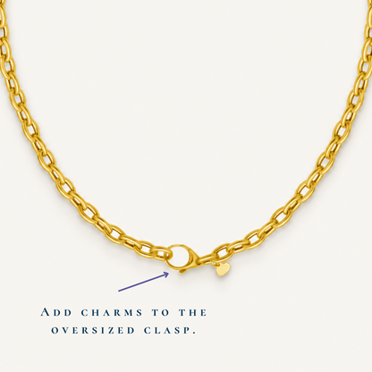 Yellow gold rolo link necklace with oversized clasp designed for adding charms
