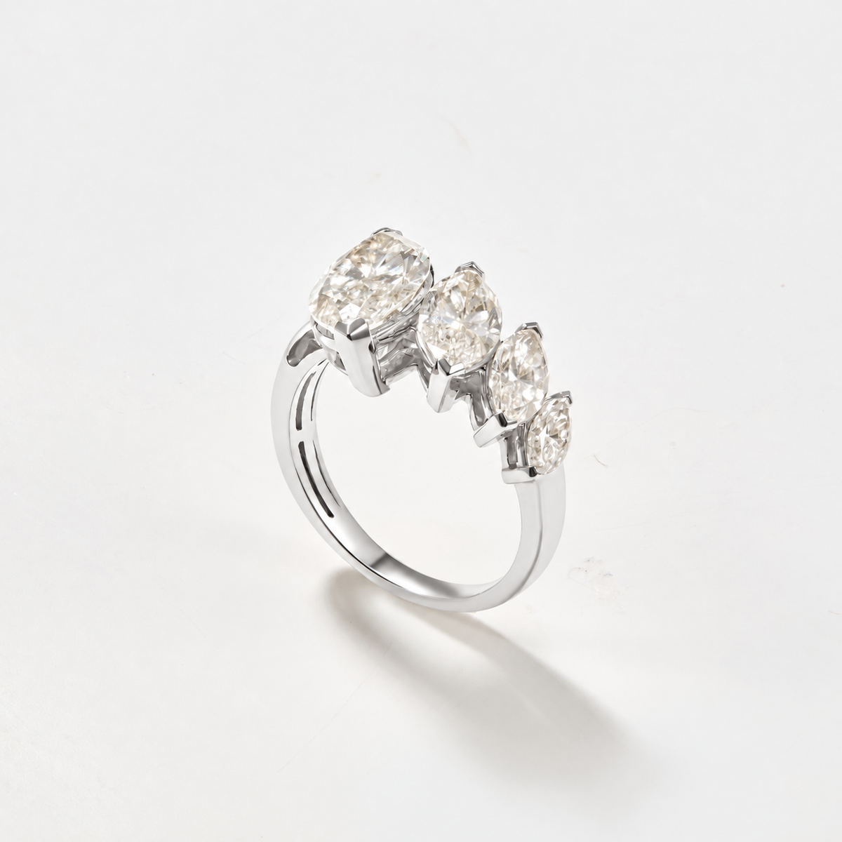 Four-stone graduated marquise-cut lab-grown diamond ring set in polished 14K white gold.