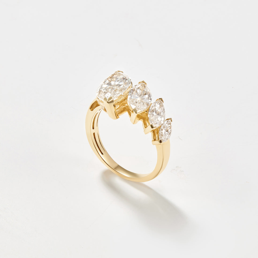 Graduated lab-grown diamond ring featuring four ascending marquise-cut diamonds in 14K yellow gold.