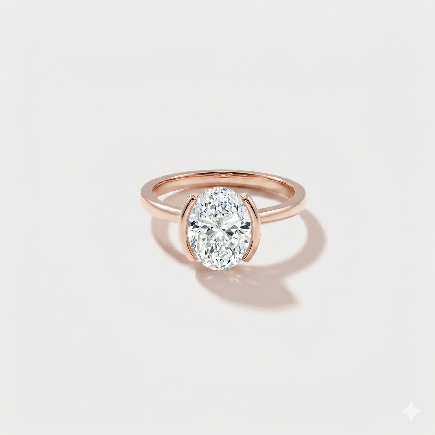Oval bezel band solitaire lab-grown diamond engagement ring in 14K rose gold