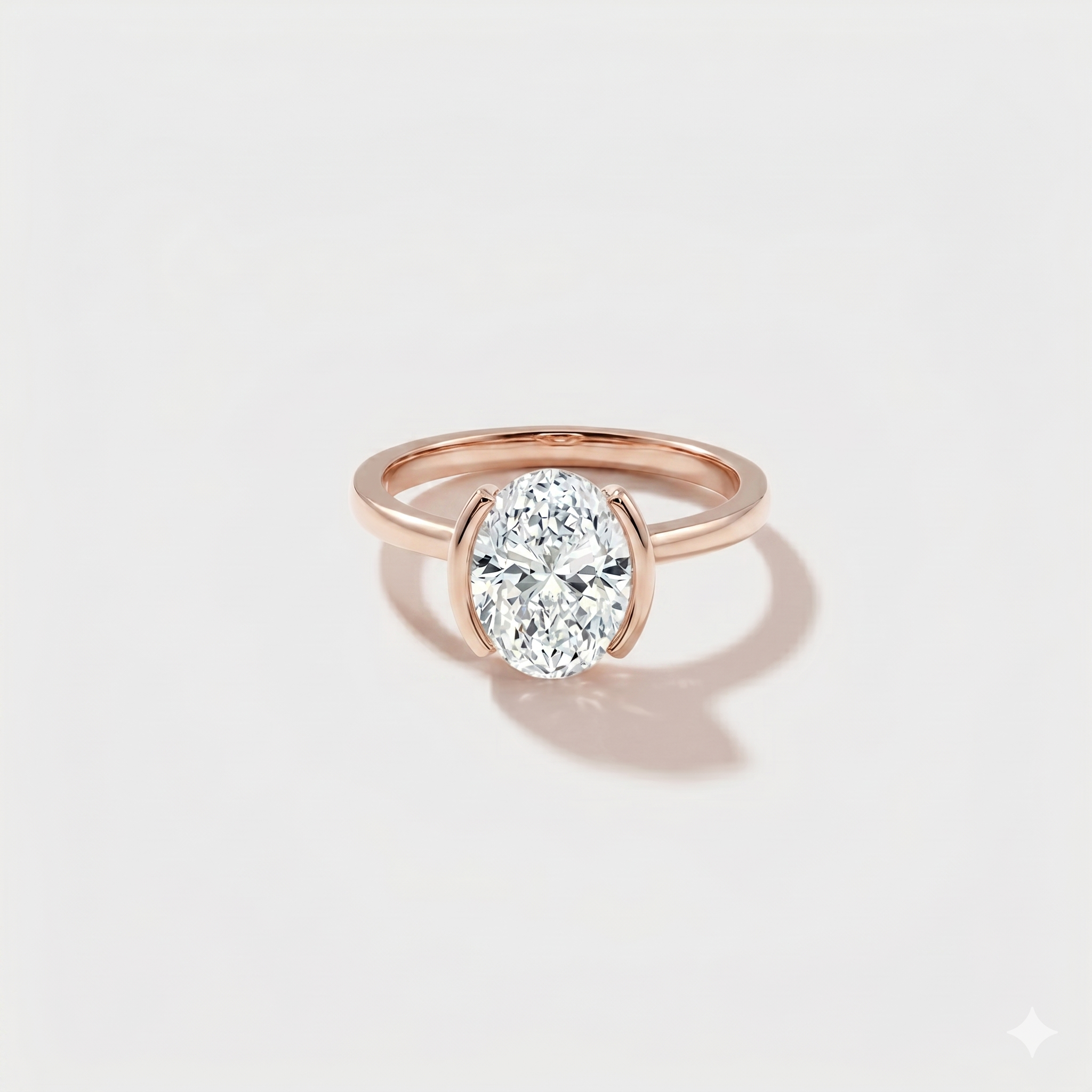 Oval bezel band solitaire lab-grown diamond engagement ring in 14K rose gold