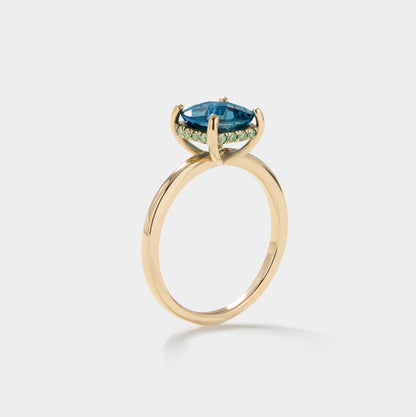 Wequassett 100th Centennial ring in 14k gold featuring a London Blue Topaz center stone with diamond accents, inspired by Cape Cod coastal heritage.