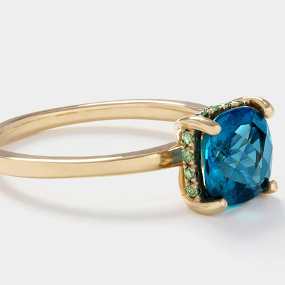 Hydrangea Ring with London Blue Topaz in gold worn as a meaningful Mother’s Day gift