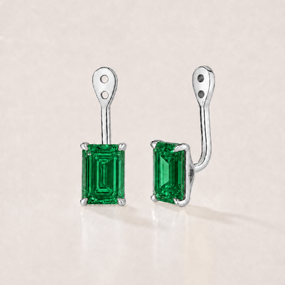 Side view of lab-grown emerald earring jackets with two adjustable stud positions in 14K white gold.