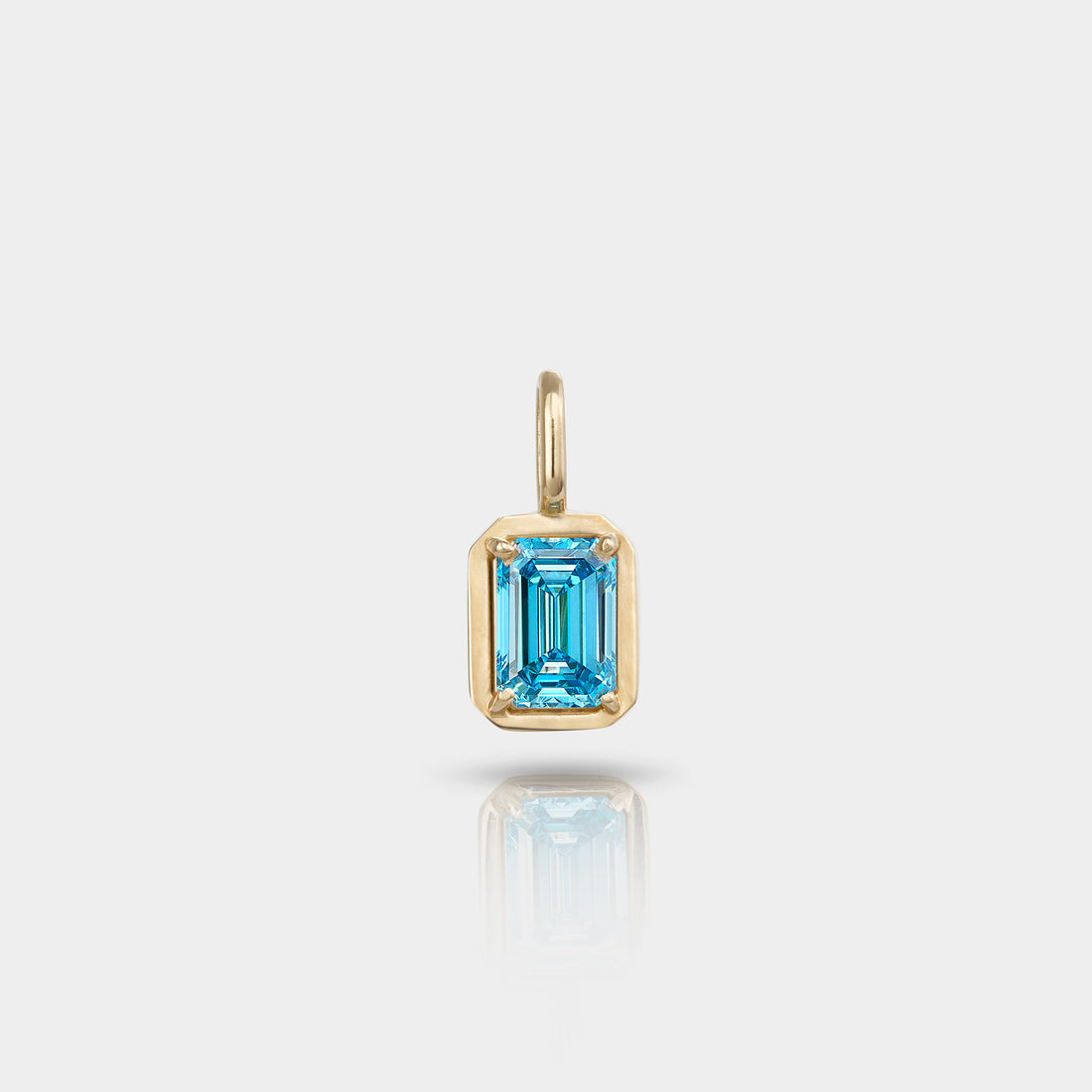 blue emerald-cut lab-grown diamond pendant in polished 14k gold