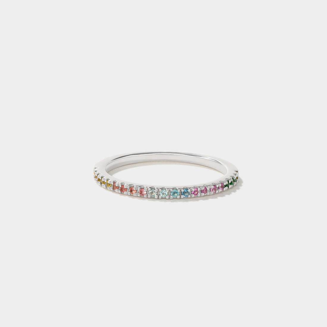 Delicate natural rainbow gemstone stacking ring crafted in solid 14k white gold