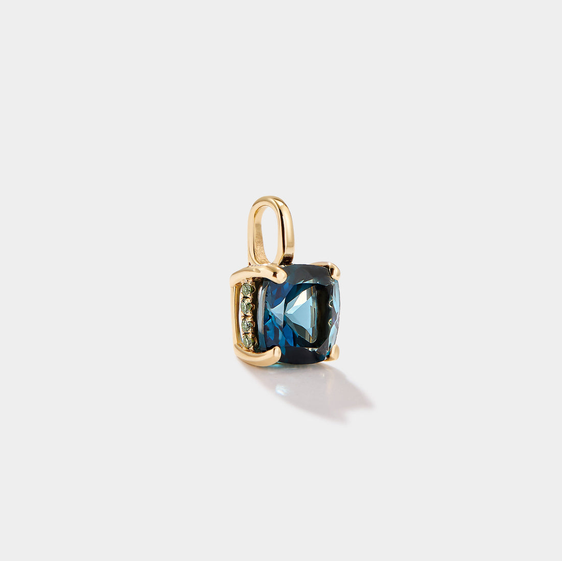 London Blue Topaz pendant in 14k gold with lab grown green diamond halo