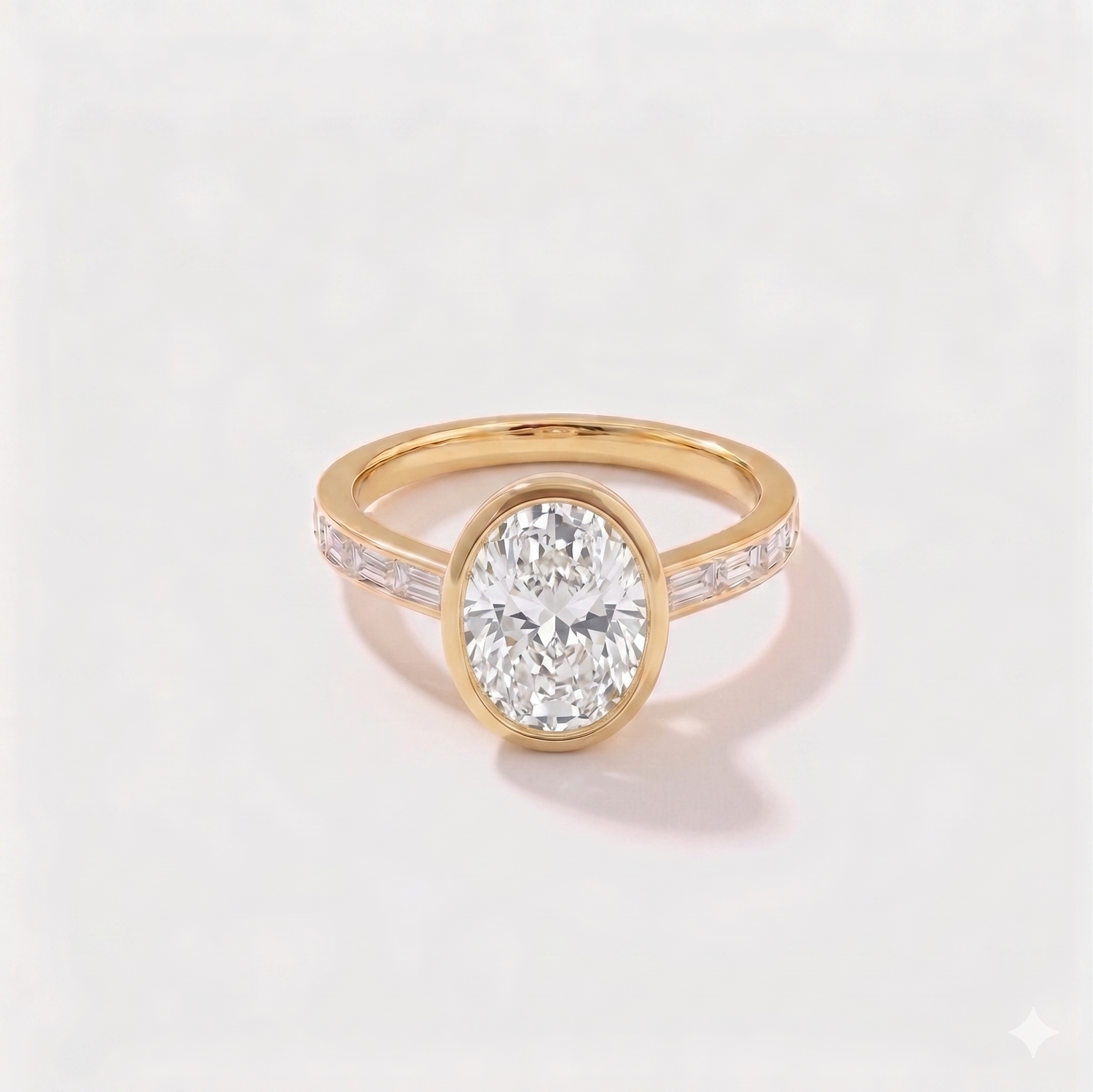 Oval bezel channel set solitaire lab-grown diamond engagement ring in 14K yellow gold by Cove Fine Jewelry