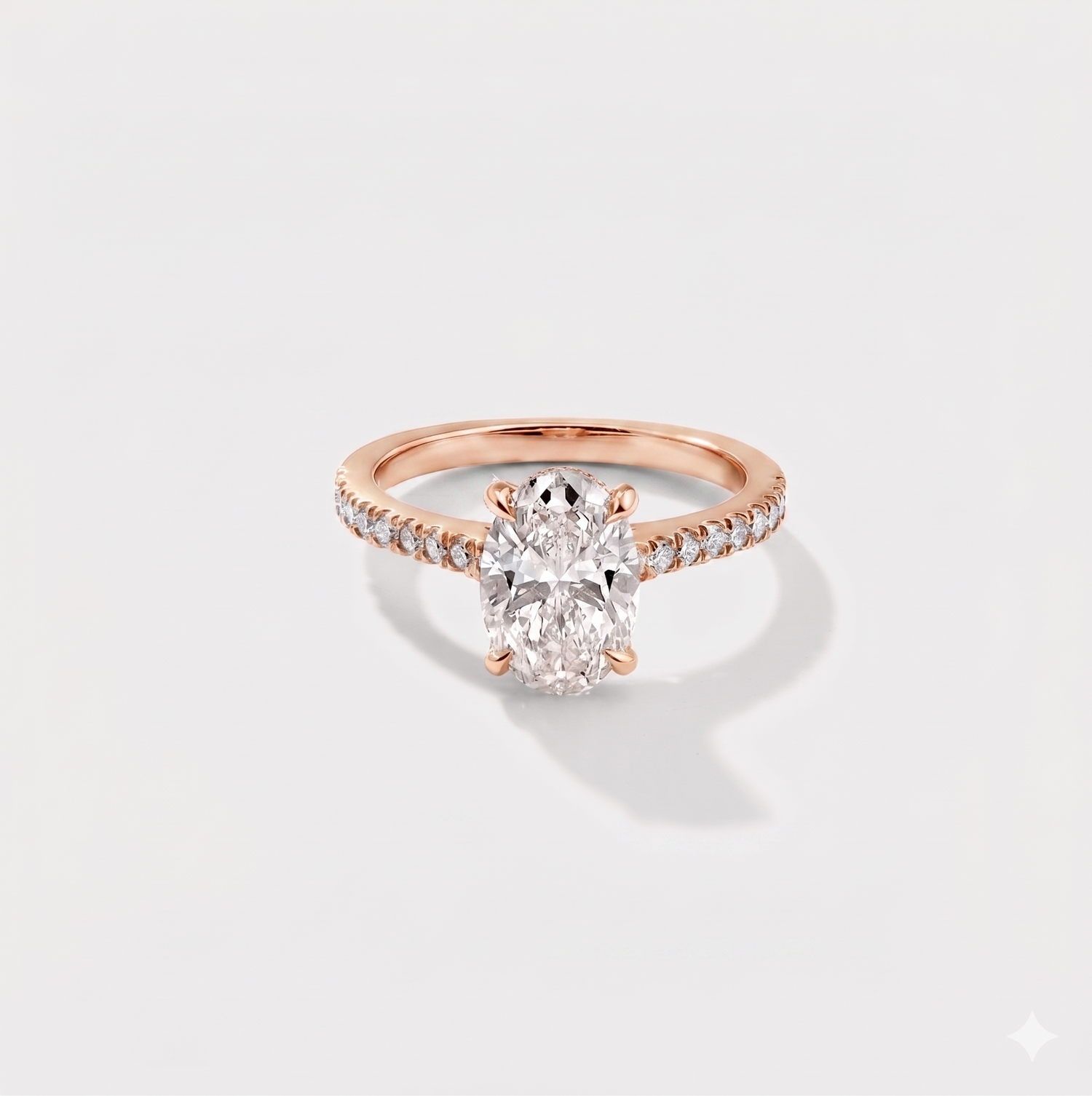 Oval cathedral halo lab-grown diamond engagement ring in 14K rose gold by Cove Fine Jewelry