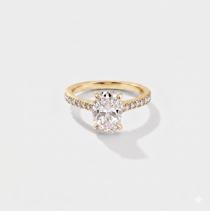 Oval cathedral halo lab-grown diamond engagement ring in 14K yellow gold by Cove Fine Jewelry